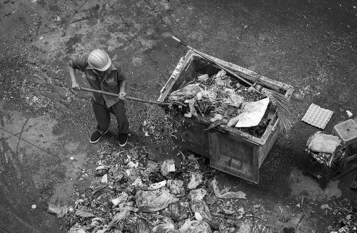 Professional rubbish clearance team handling furniture disposal in London