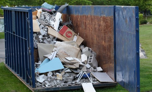 Operatives preparing for a rubbish clearance job on a London street