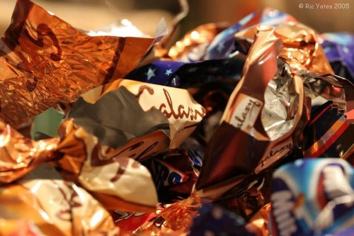 Large vehicle collecting commercial waste from a busy London high street